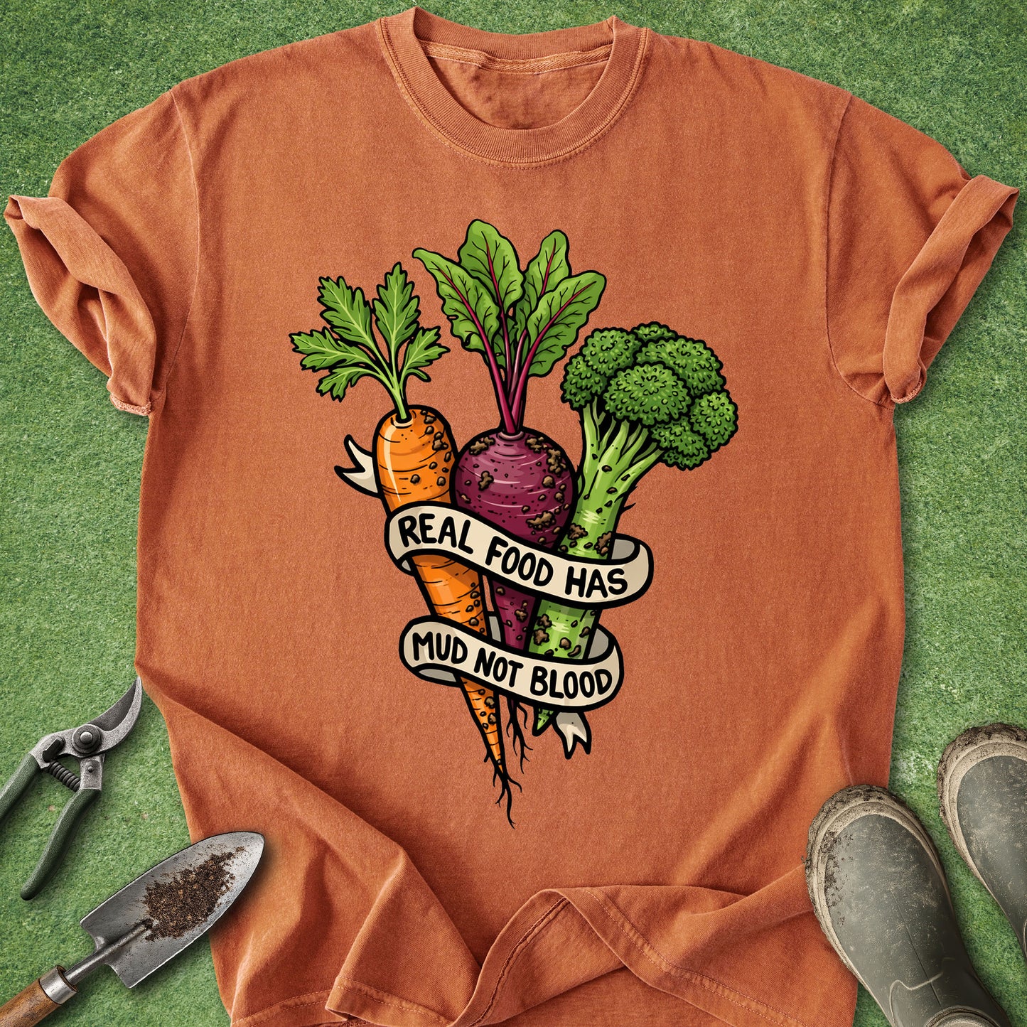 Orange t-shirt with vegetable graphic and text on a green background