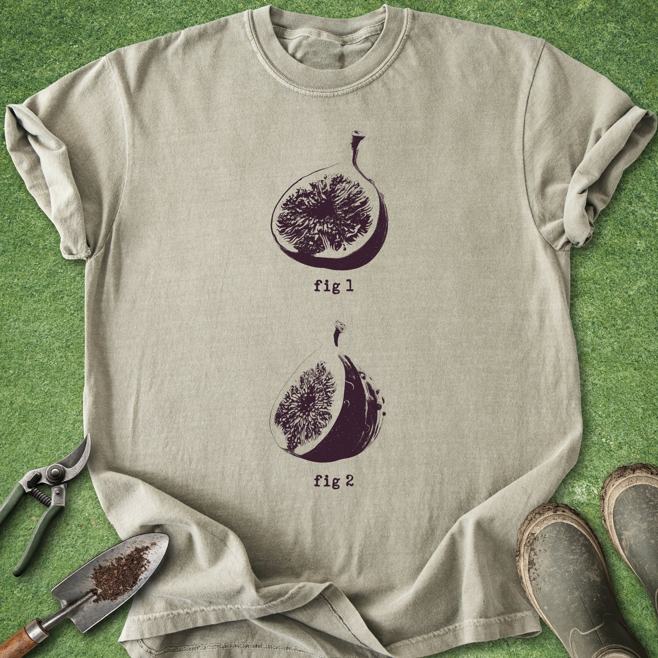 Beige t-shirt with fig design on a green grass background