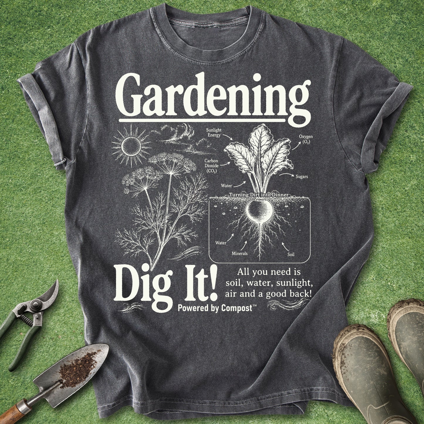 Gray t-shirt with gardening graphic and text on a green grass background