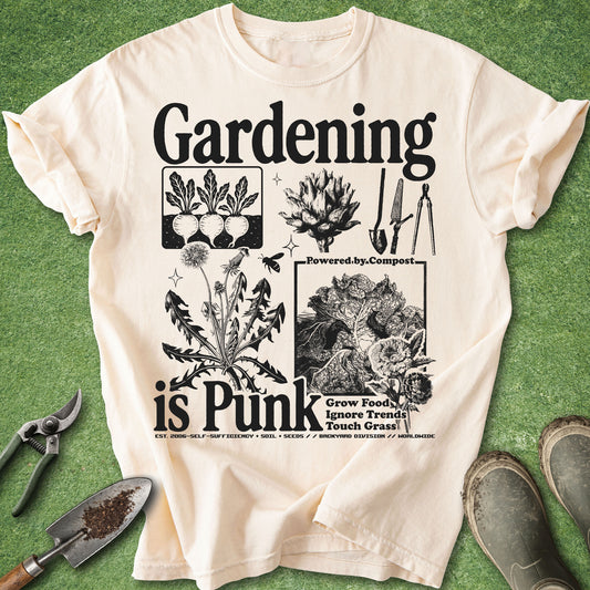Comfort Colors ivory t-shirt featuring the phrase "Gardening Is Punk" with vintage botanical illustrations, vegetables, dandelions, compost artwork, and classic gardening tools in black ink.