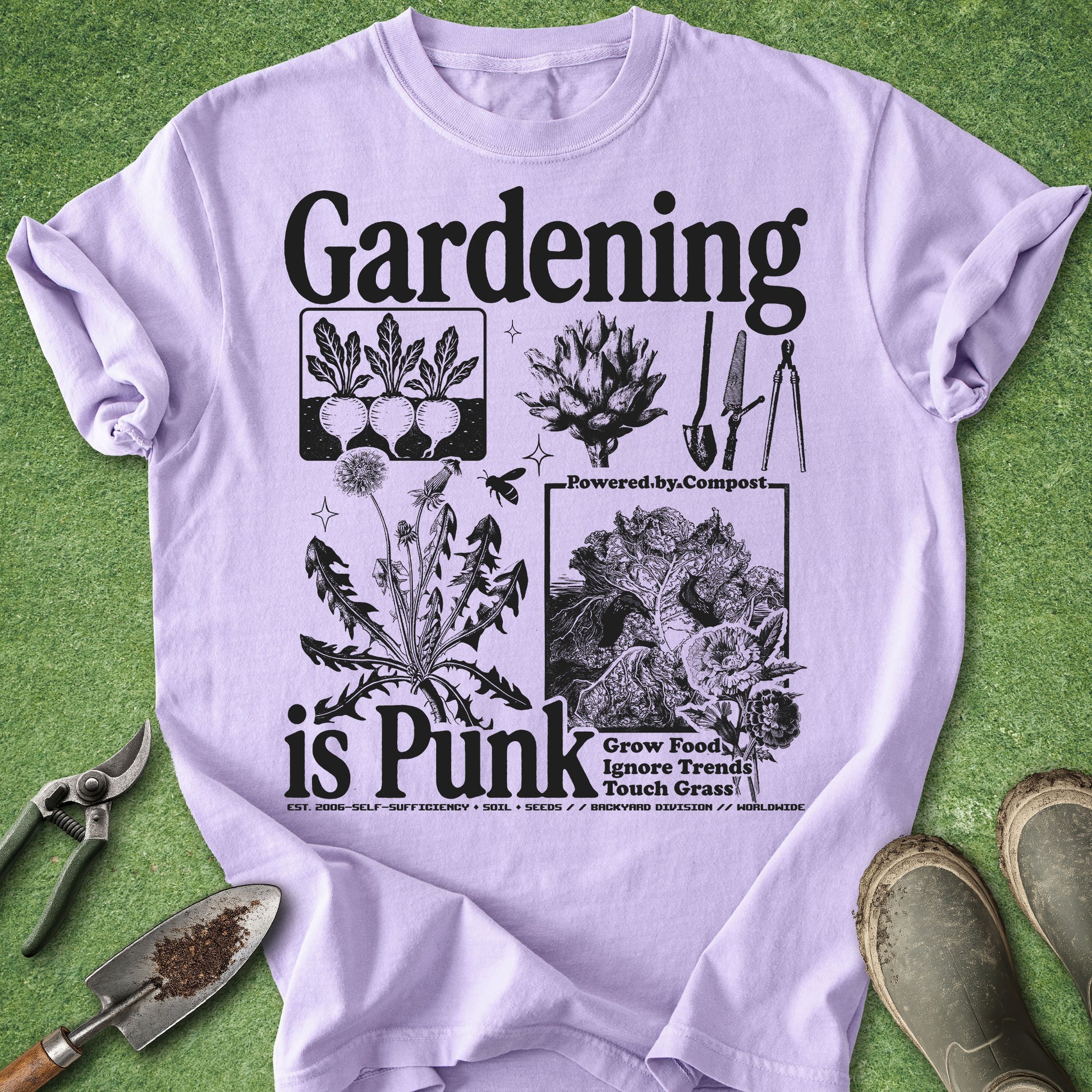Comfort Colors Orchid t-shirt featuring the phrase "Gardening Is Punk" with vintage botanical illustrations, vegetables, dandelions, compost artwork, and classic gardening tools in black ink.