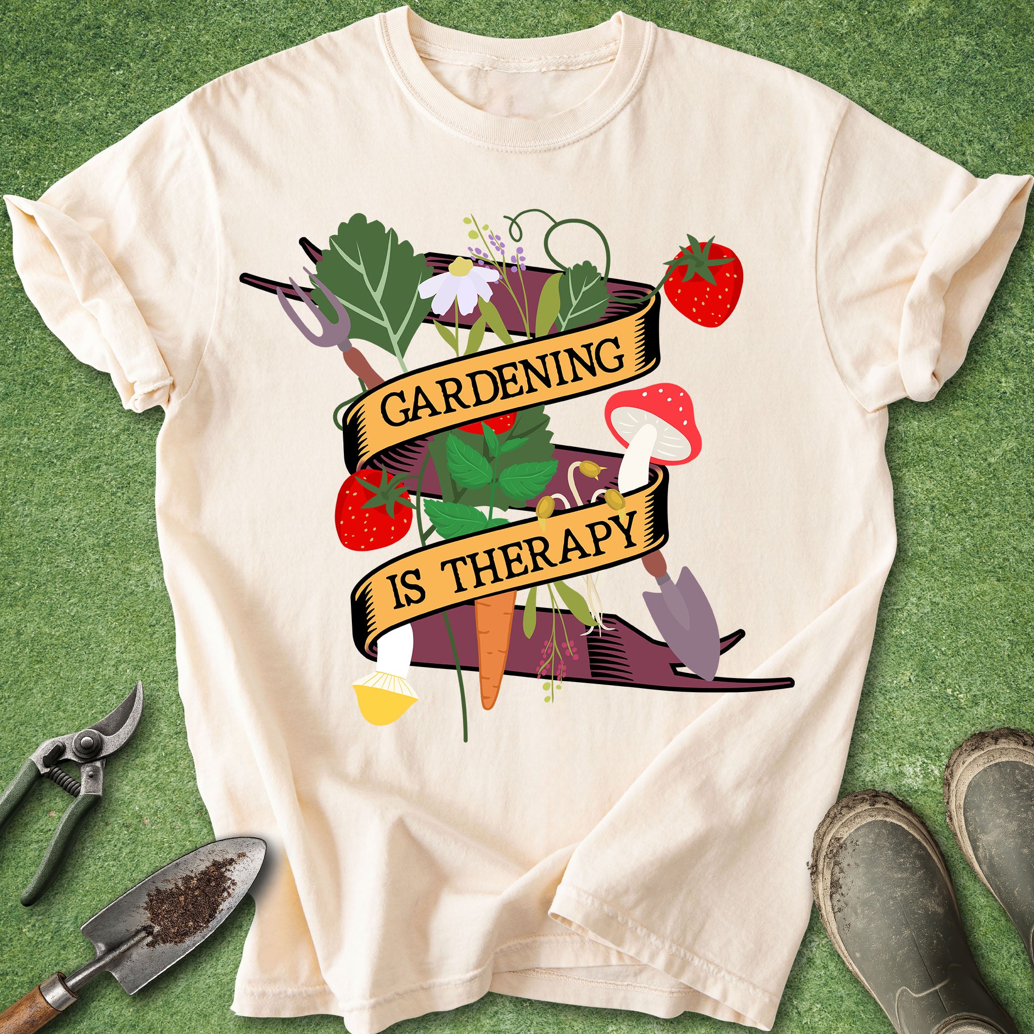 White t-shirt with 'Gardening is Therapy' graphic on a green background
