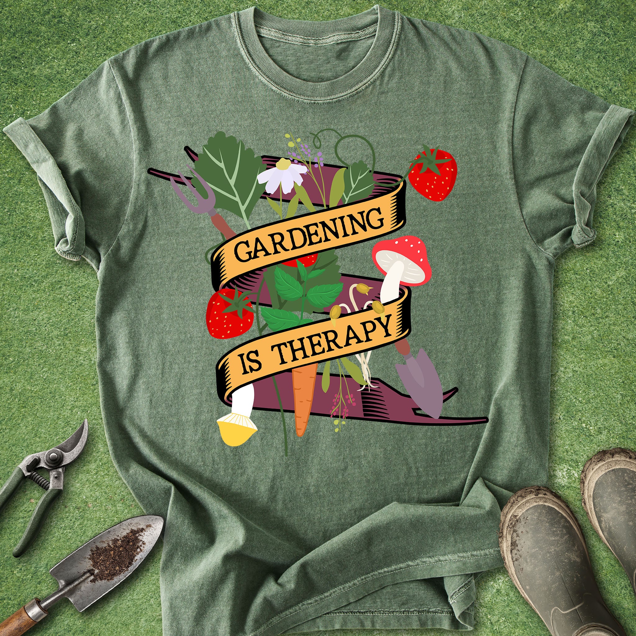 Green t-shirt with 'Gardening is Therapy' design on a grass background