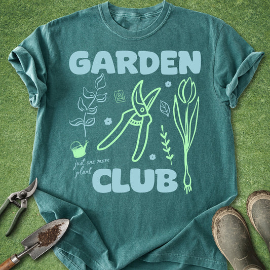 Green t-shirt with 'Garden Club' design on a grass background