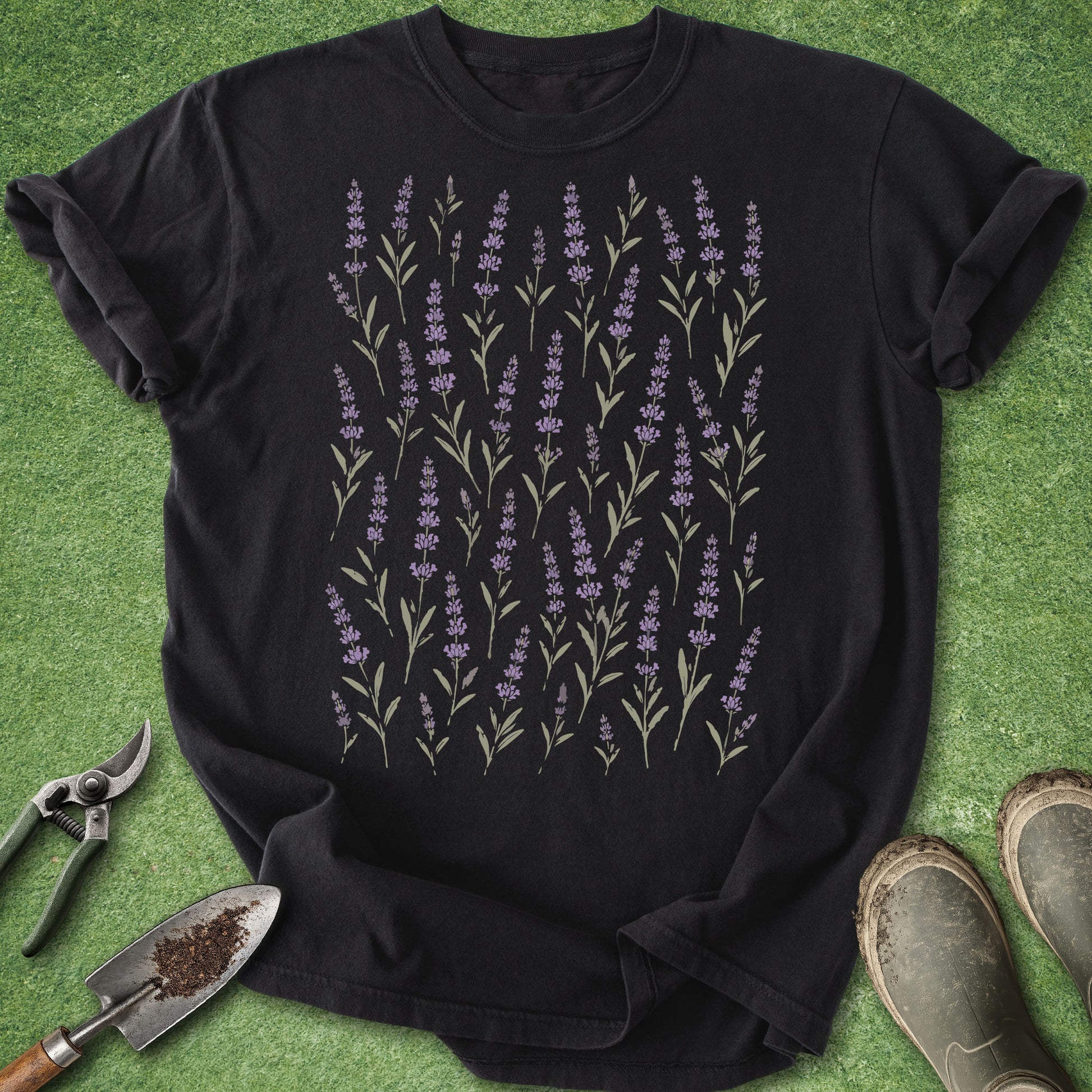 black botanical t-shirt featuring an all-over pattern of delicate lavender stems in soft purple and sage green.