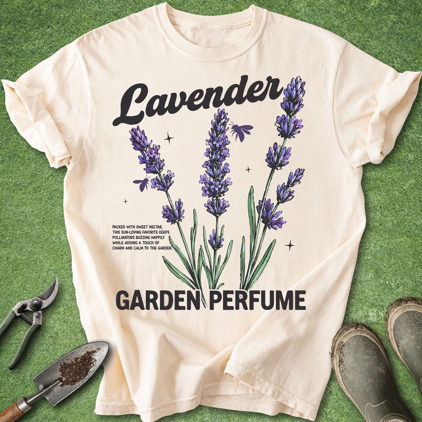 Beige t-shirt with lavender design and text on a green background
