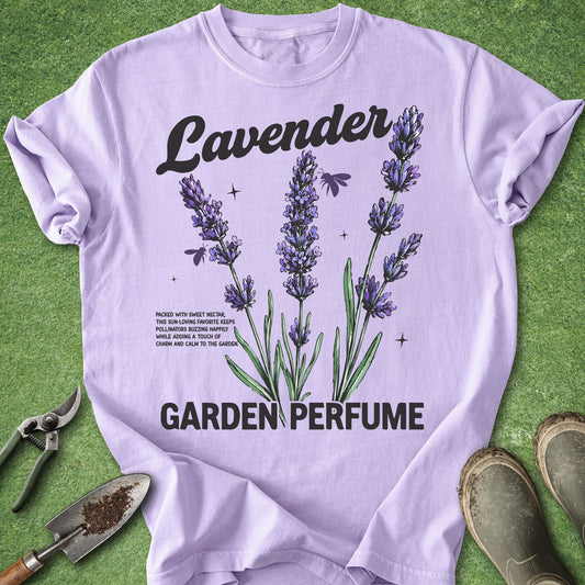 Orchid Comfort Colors t-shirt featuring blooming lavender stems, bees, and the phrase "Lavender Garden Perfume" in a botanical floral design.