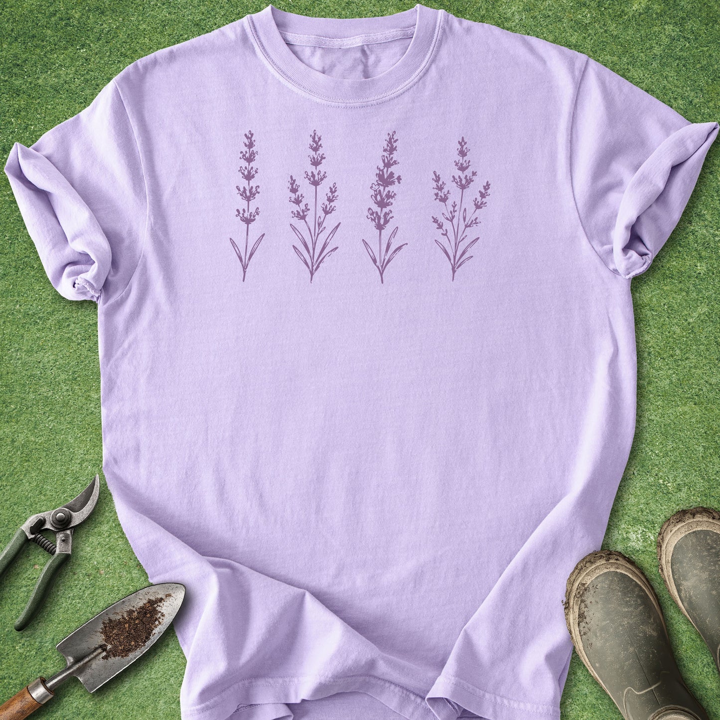 Purple t-shirt with lavender plant design on a green background