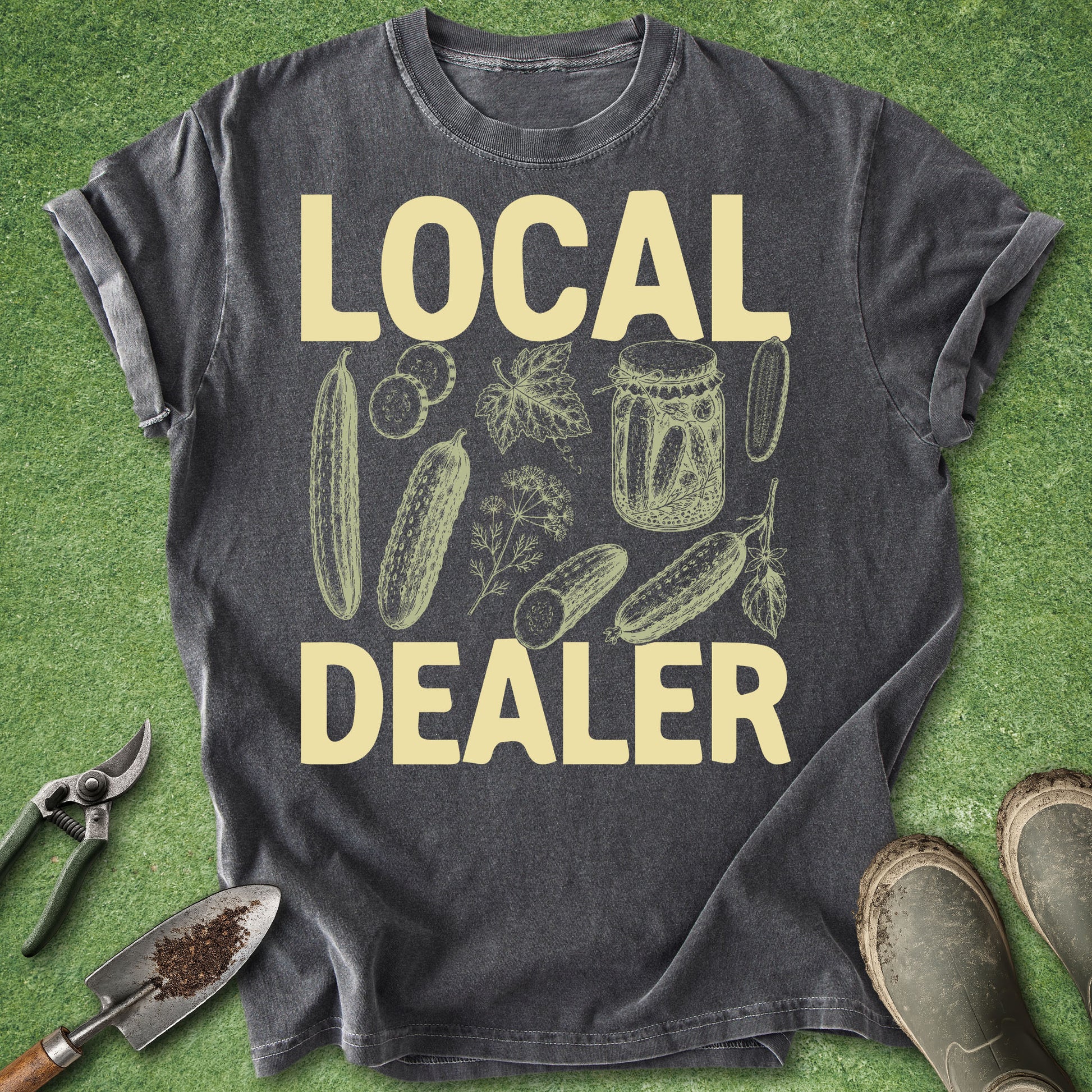 Gray t-shirt with 'LOCAL DEALER' text and garden graphics on a green background