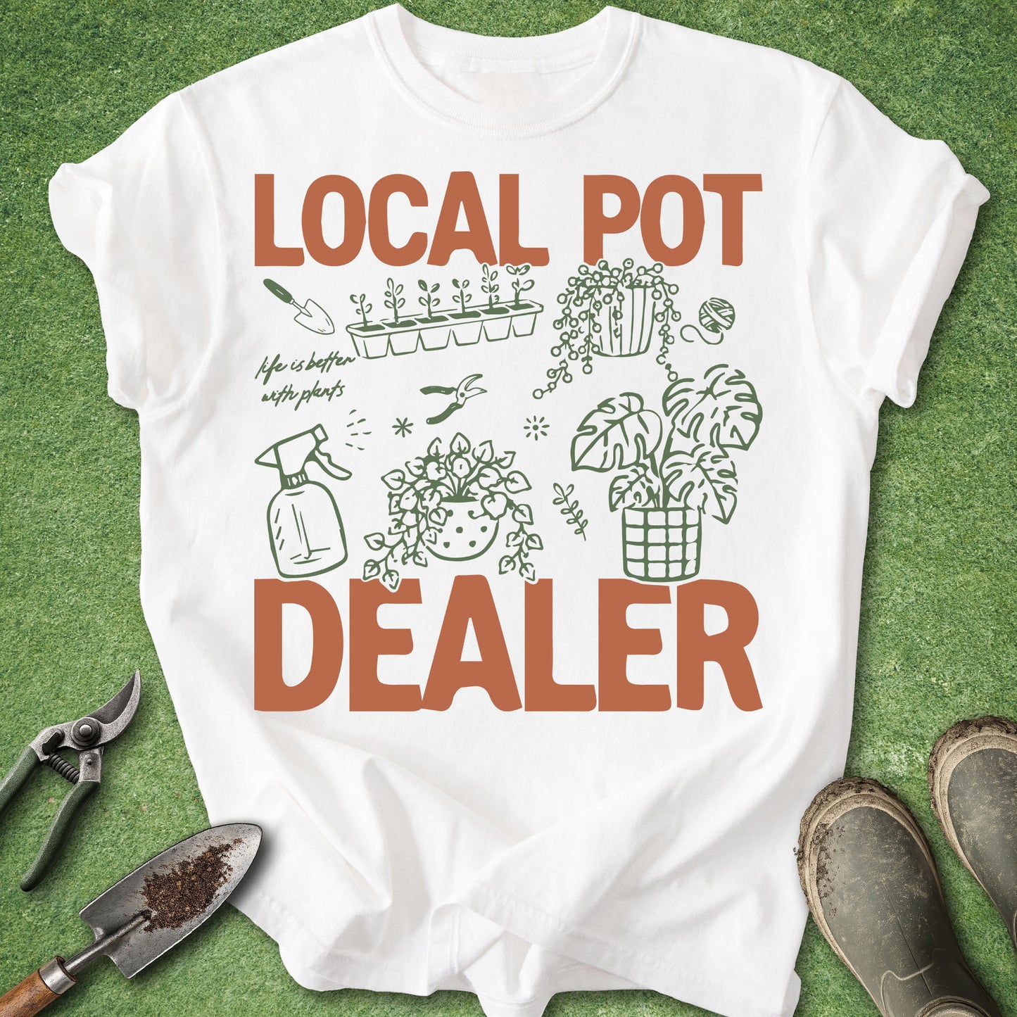 White Comfort Colors t-shirt featuring the phrase "Local Pot Dealer" with illustrated houseplants, propagation tray, watering spray bottle, pruning shears, hanging plant, monstera, and indoor gardening accessories.