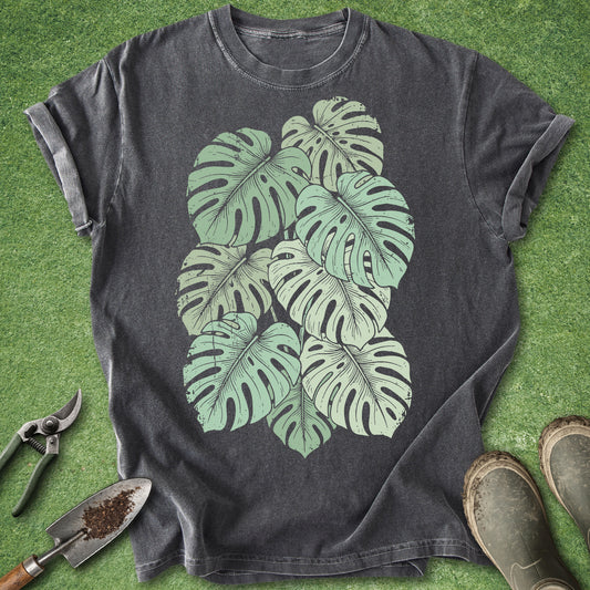 Minimal monstera leaf botanical graphic on vintage black plant lover t-shirt