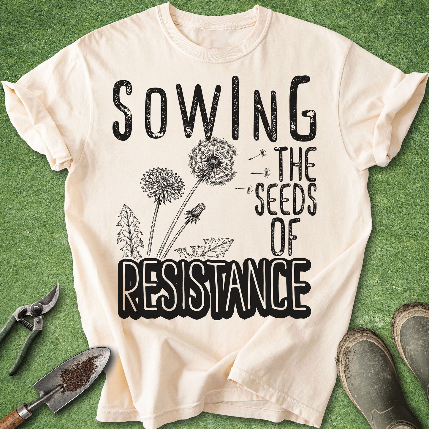 Gardening t-shirt with vintage dandelion illustration and the phrase Sowing the Seeds of Resistance