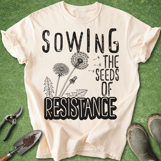 Gardening t-shirt with vintage dandelion illustration and the phrase Sowing the Seeds of Resistance