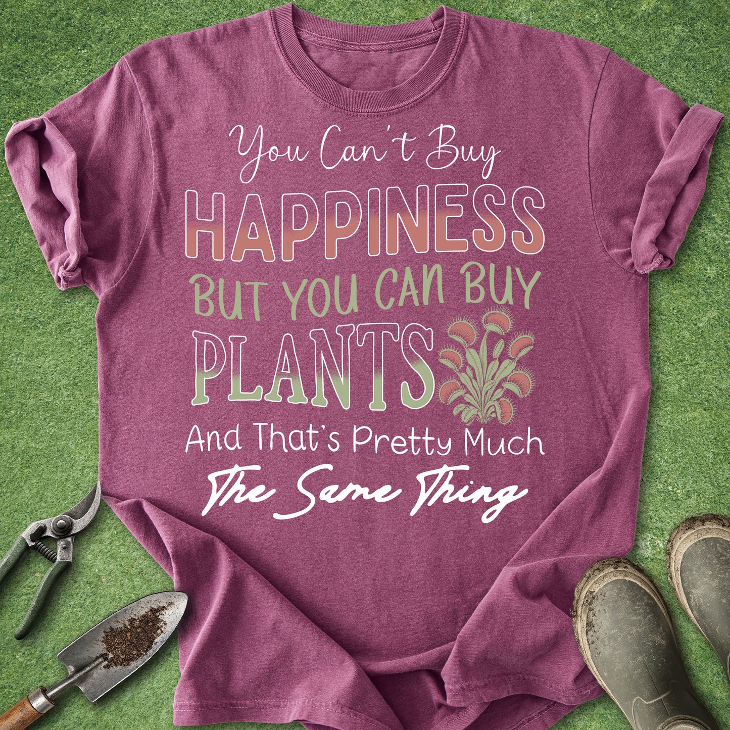 Purple t-shirt with gardening-themed text on a green background