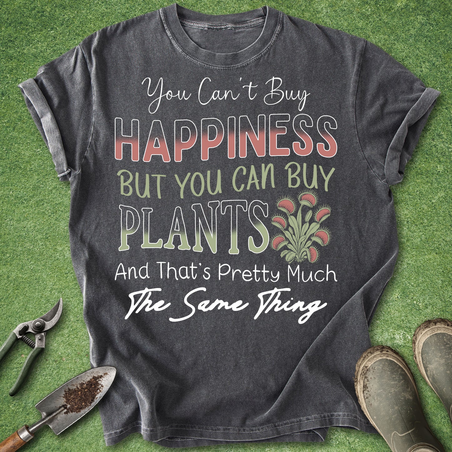Gray t-shirt with gardening-themed text on a green grass background