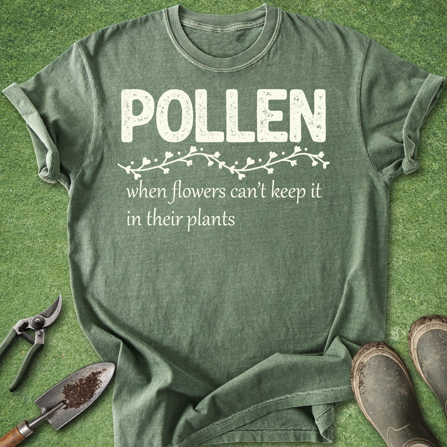 Green t-shirt with 'Pollen' text on a grass background