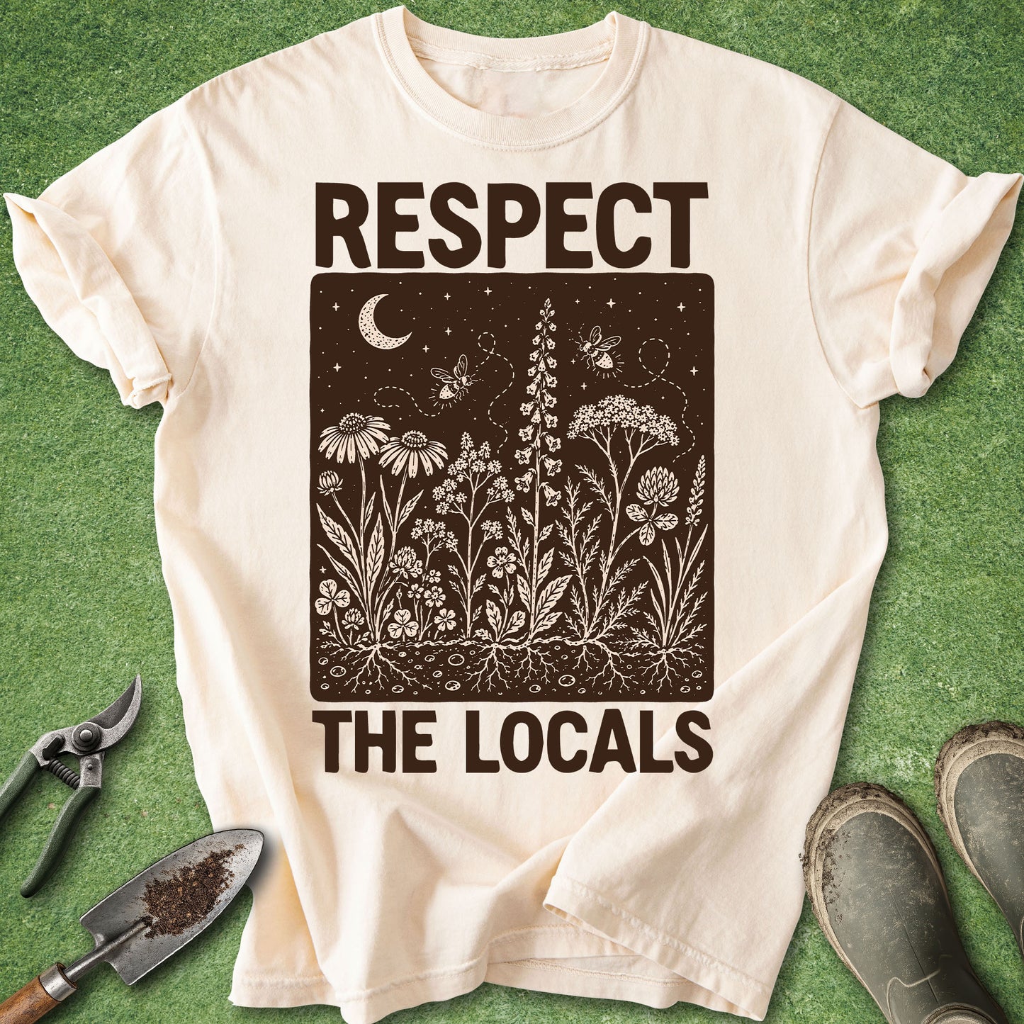 Beige t-shirt with 'Respect the Locals' graphic on a green background