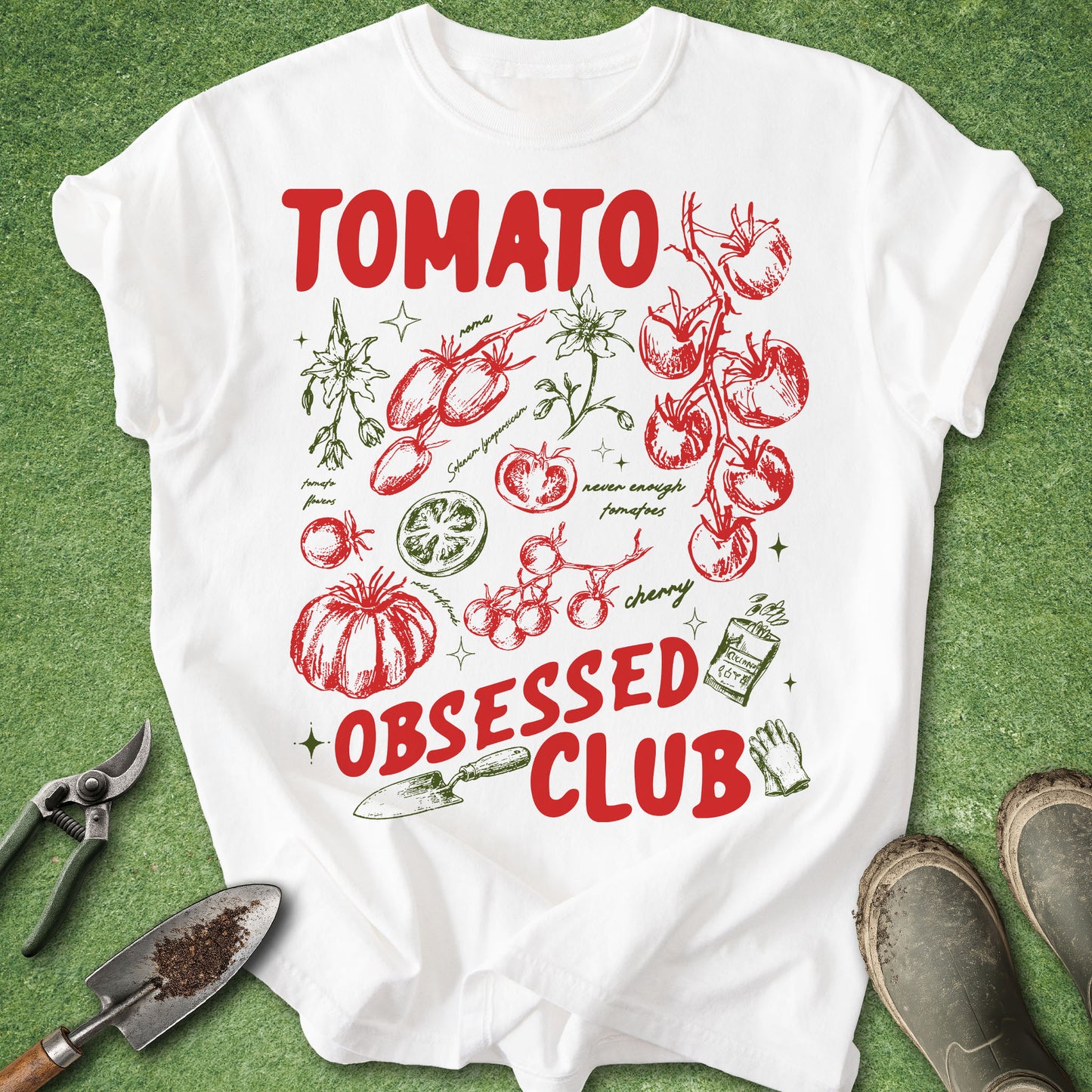 White t-shirt with tomato-themed design and text on a green background