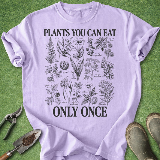Lavender t-shirt with “Plants You Can Eat Only Once” text and vintage botanical illustrations of poisonous and toxic plants including nightshade, hemlock, oleander and foxglove.