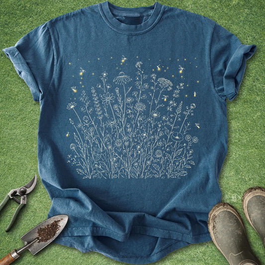 Botanical wildflower meadow shirt featuring delicate white floral line art with glowing fireflies on a dark blue background.