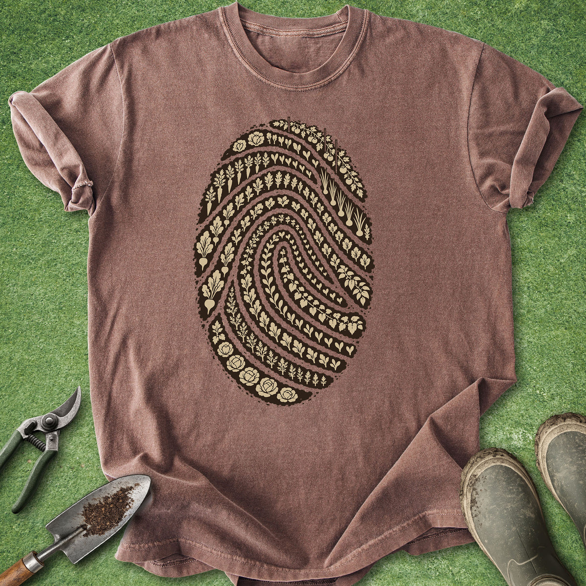 Garden fingerprint shirt featuring a large fingerprint made from rows of vegetables, herbs, seedlings and leafy garden plants.