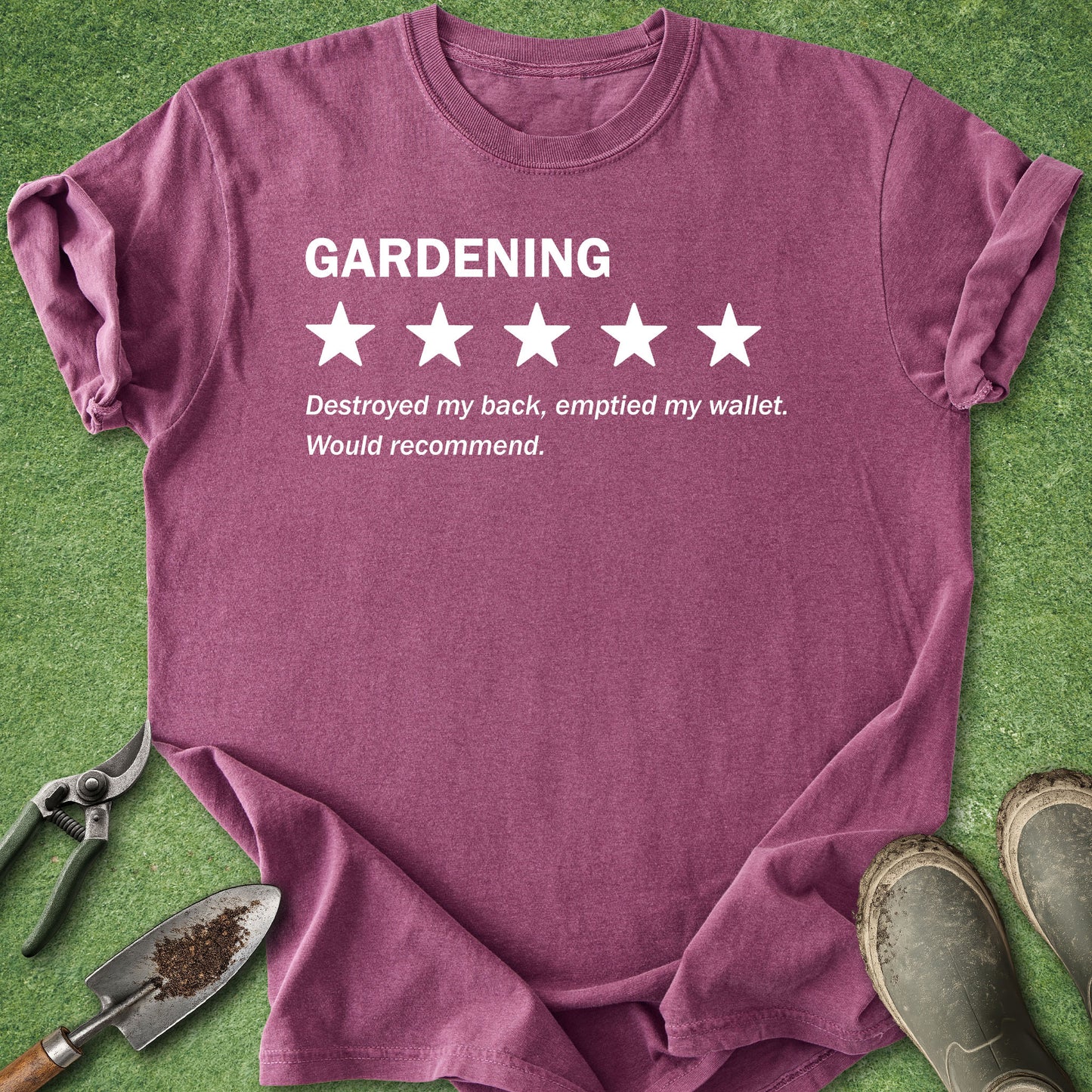 A heathered purple short-sleeve t-shirt with a white graphic print that reads 'GARDENING' above a 1-star rating and the phrase 'Destroyed my back, emptied my wallet. Would recommend.