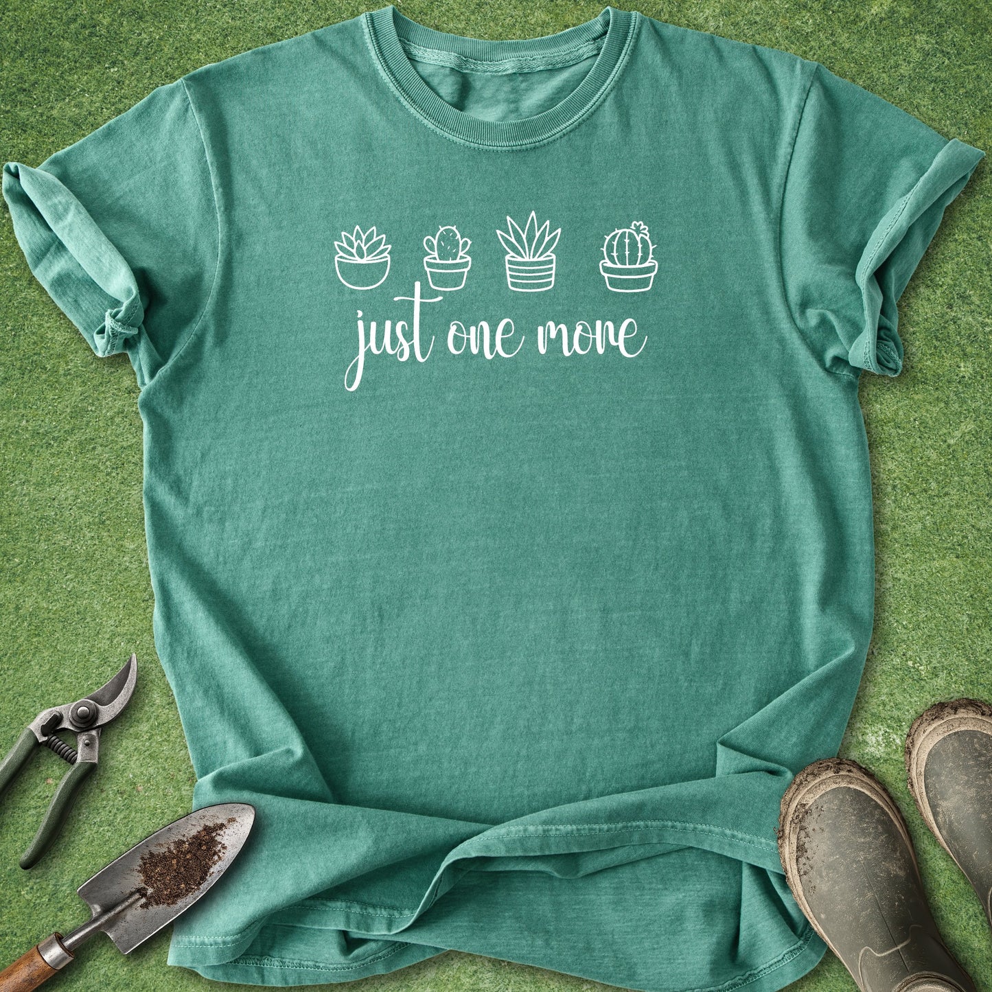 Green t-shirt with plant designs and text on a green background