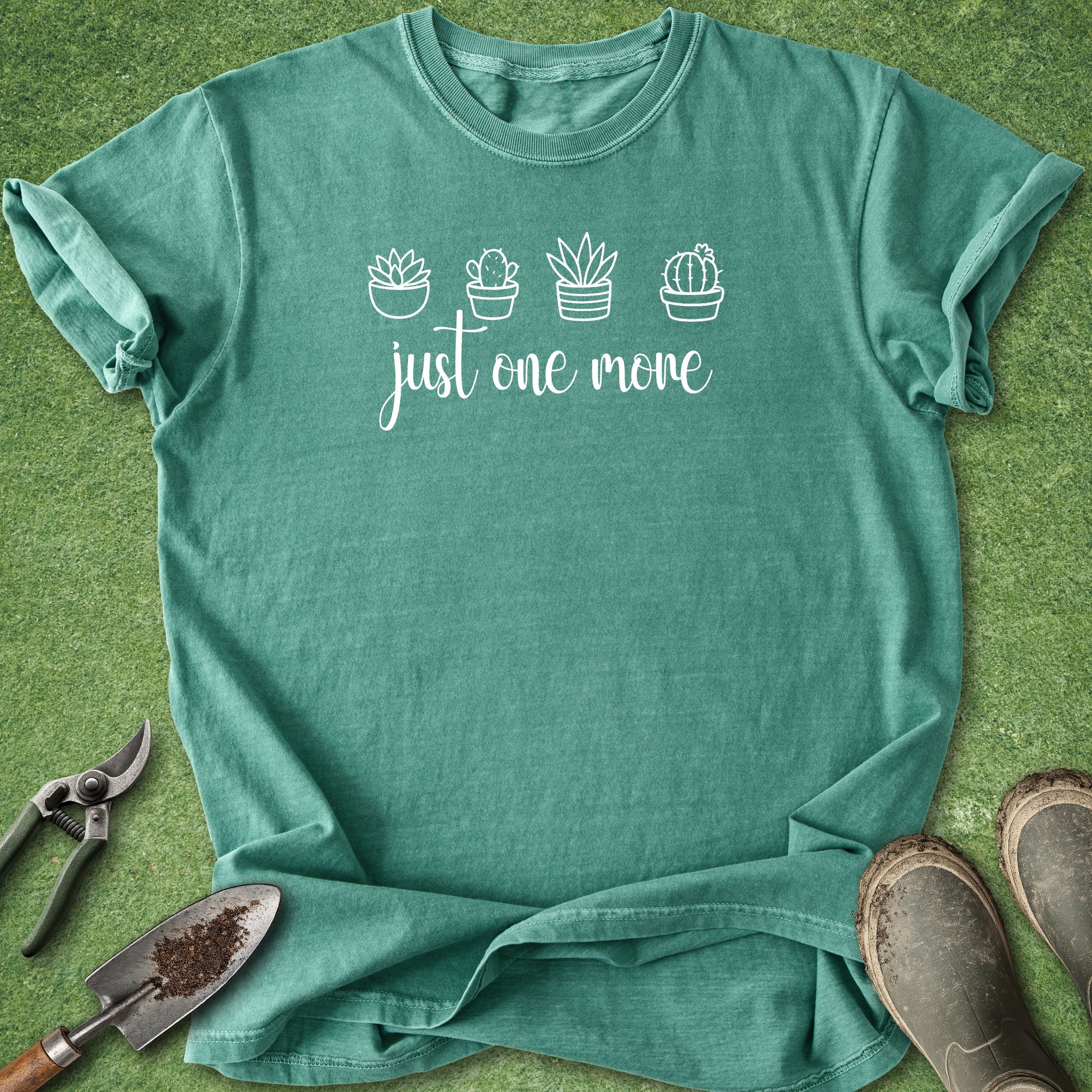 Green t-shirt with plant designs and text on a green background