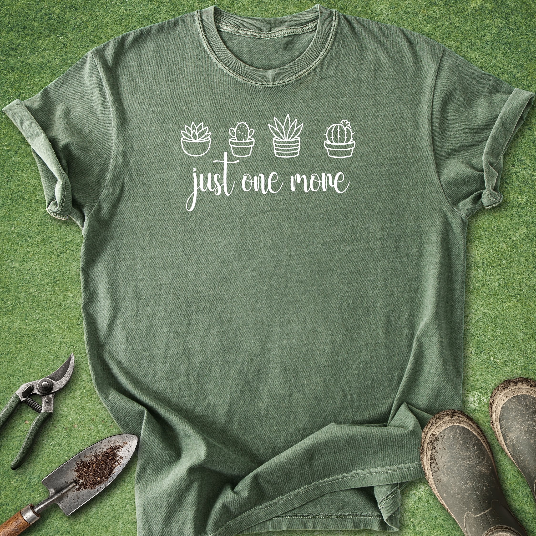 Green t-shirt with cactus design and text on a green background